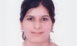 Portrait of a smiling person, white background.